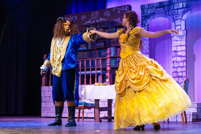 Actors perform onstage